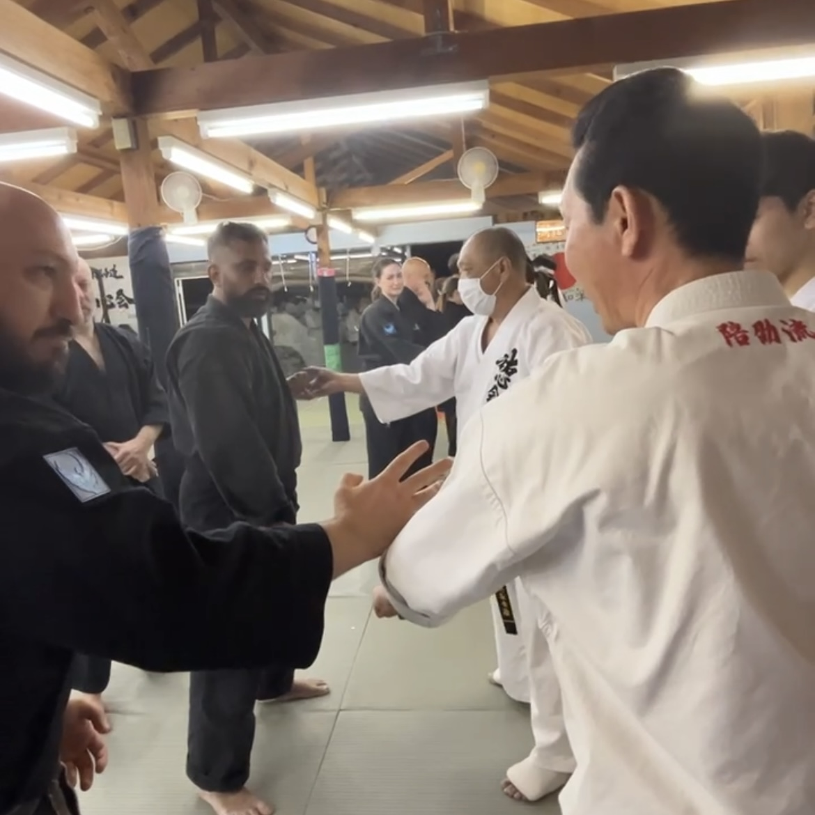 Olgun Tiltay in Ichinomiya Japan practising karate in the dojo of Funakoshi Masaharu Sensei [8th Dan Karate of Nahate Origin]